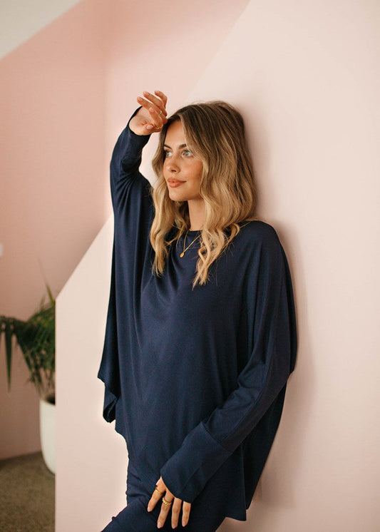 Lou Lou Australia Susie Oversized Asymmetrical Bamboo Top in navy.