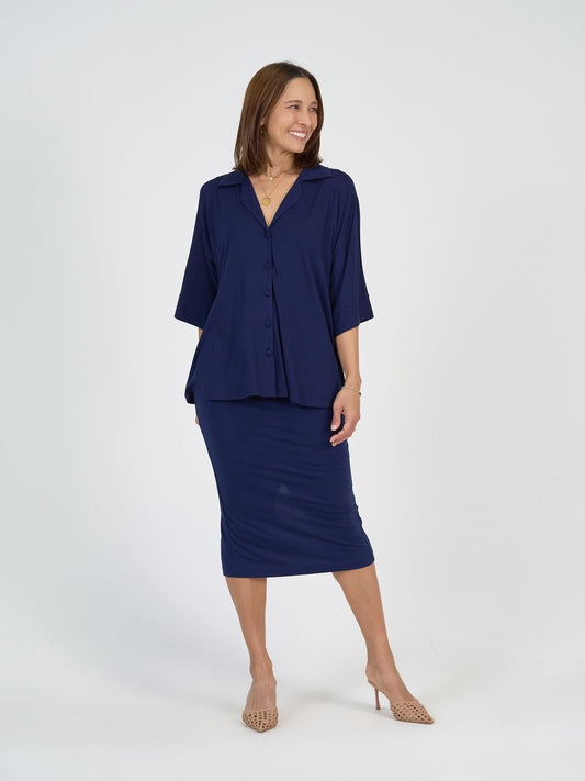 The Lesson Set by Lou Lou Australia: bamboo navy blue collared shirt with three-quarter sleeves and matching maxi tube skirt.