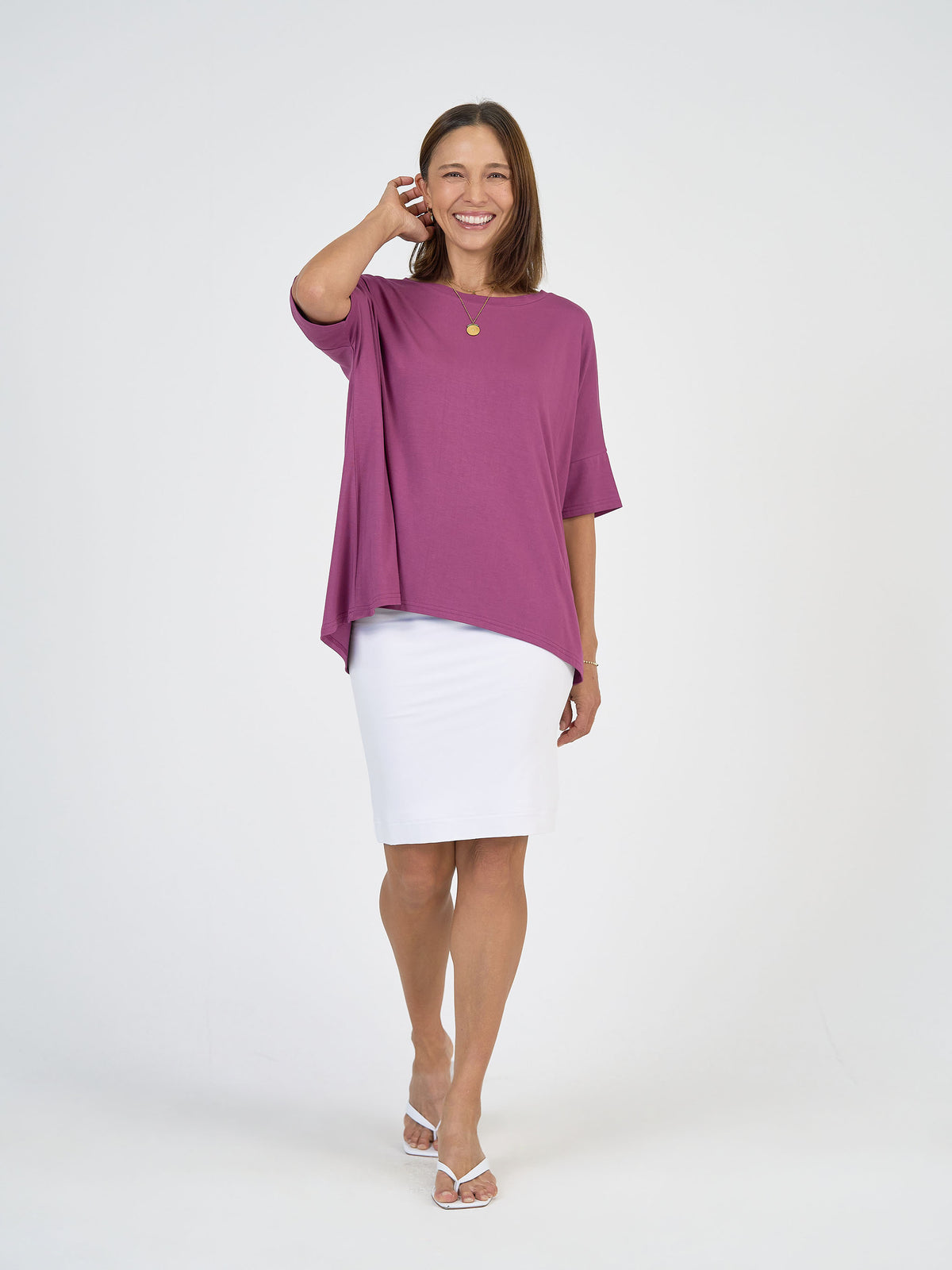 Lou Lou Australia Midi Bamboo Whitney Tube Skirt in white with a stretch waistband for a slimming fit.