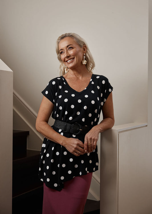 Lou Lou Australia Holiday Asymmetrical Bamboo V-Neck T-Shirt in polka dot.