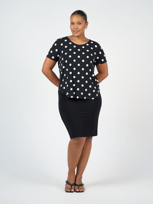 Lou Lou Australia Janis Short Sleeve Bamboo T-Shirt in a playful black and white polka dot pattern, made from breathable bamboo fabric.