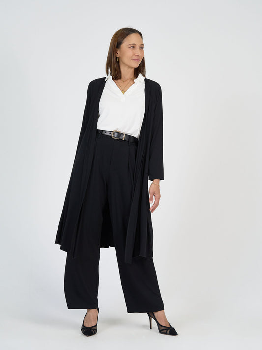 The Boardroom Set by Lou Lou Australia: bamboo black long cardigan, white collared polo blouse, black wide leg pants with belt.