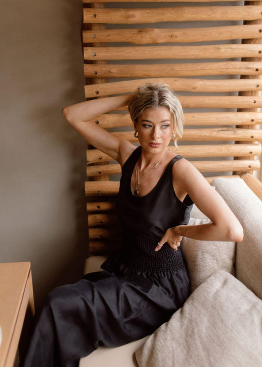 The Iris Silk Sleeveless Camisole by Lou Lou Australia in soft beige silk, featuring a relaxed bamboo blend.