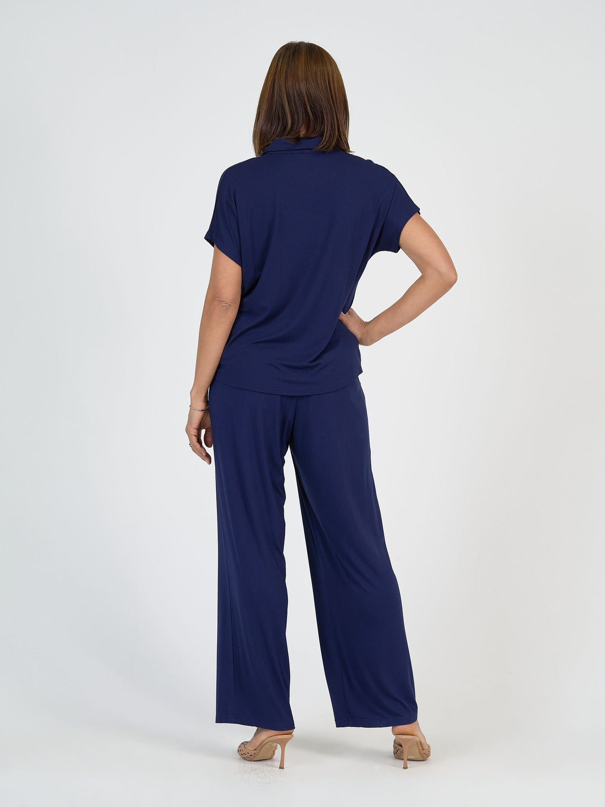 Lou Lou Australia Rush Bamboo Short Sleeve Collared Polo Top in navy with matching wide-leg bamboo pants.