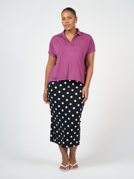 Lou Lou Australia Rush Bamboo Short Sleeve Collared Polo Top in black.