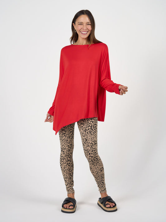 Lou Lou Australia Susie Oversized Asymmetrical Bamboo Top in Fiery Red.