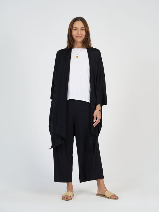 Lou Lou Australia The Focus Day Set in bamboo: black open cardigan, white top, and black wide-leg pants.