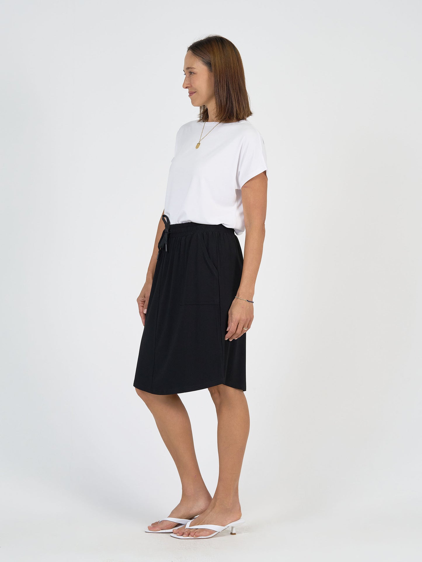Lou Lou Australia White Bamboo T Shirt with Black Mdi length skirt with pockets