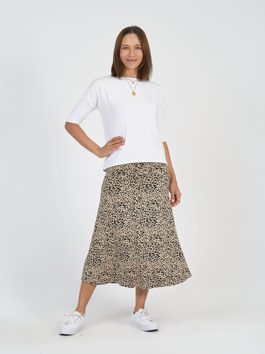 The Spring Break Set by Lou Lou Australia: white bamboo top with beige and black animal print bamboo skirt.