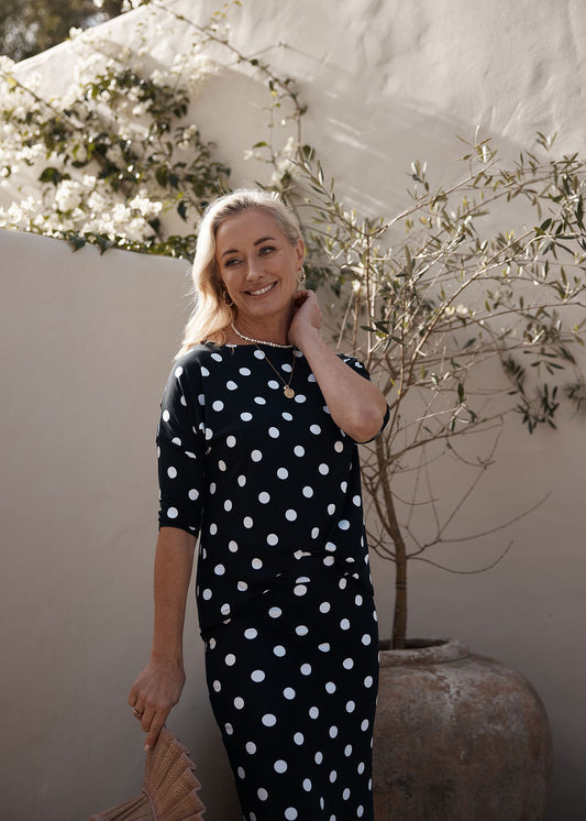 Lou Lou Australia Camila 3/4 Sleeve Bamboo Top in navy with white polka dots, featuring a relaxed box cut design.