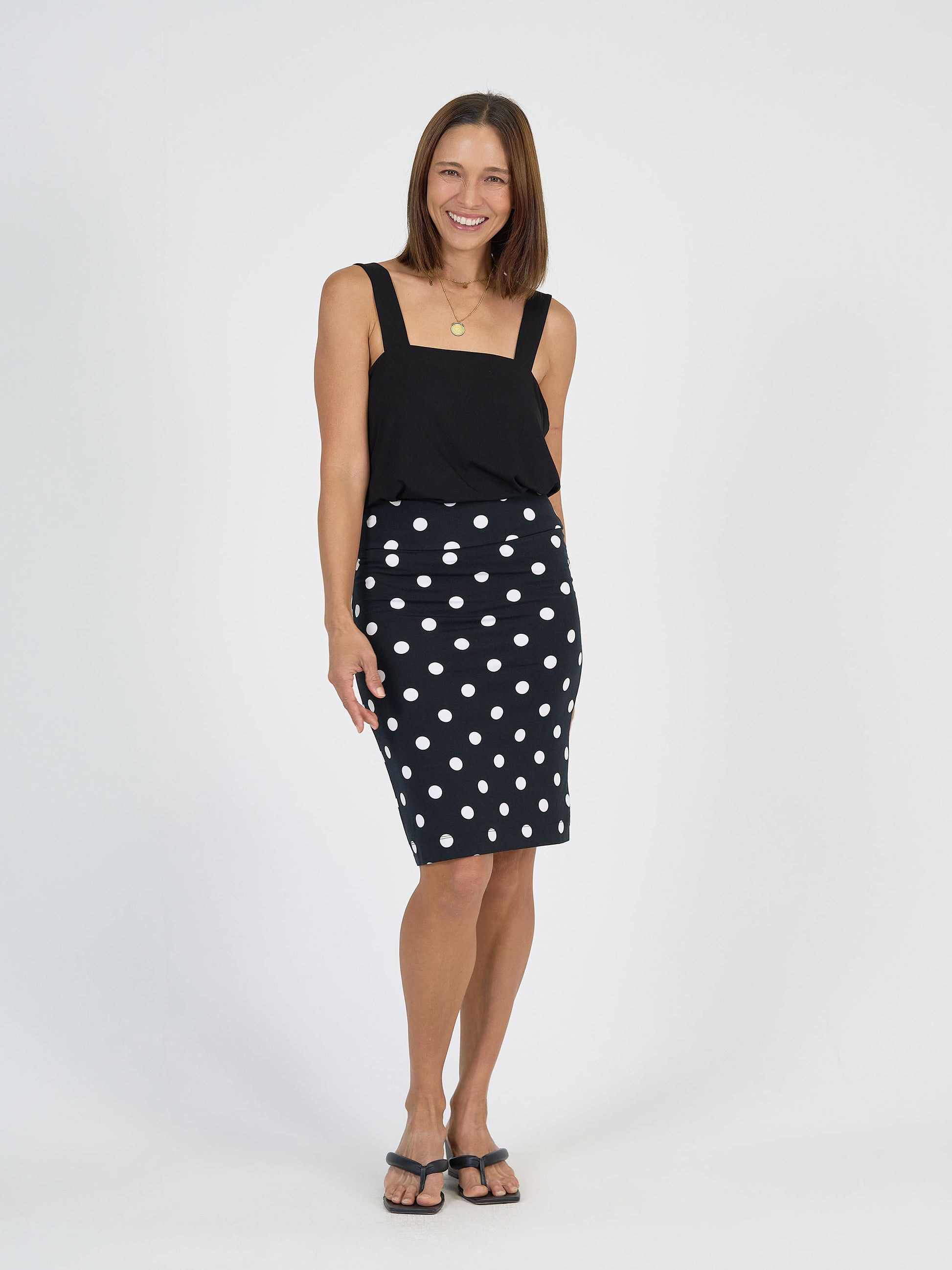 Lou Lou Australia Bamboo Black Sleeveless Top and Black and White Knee Length Polka Dot Tube skirt