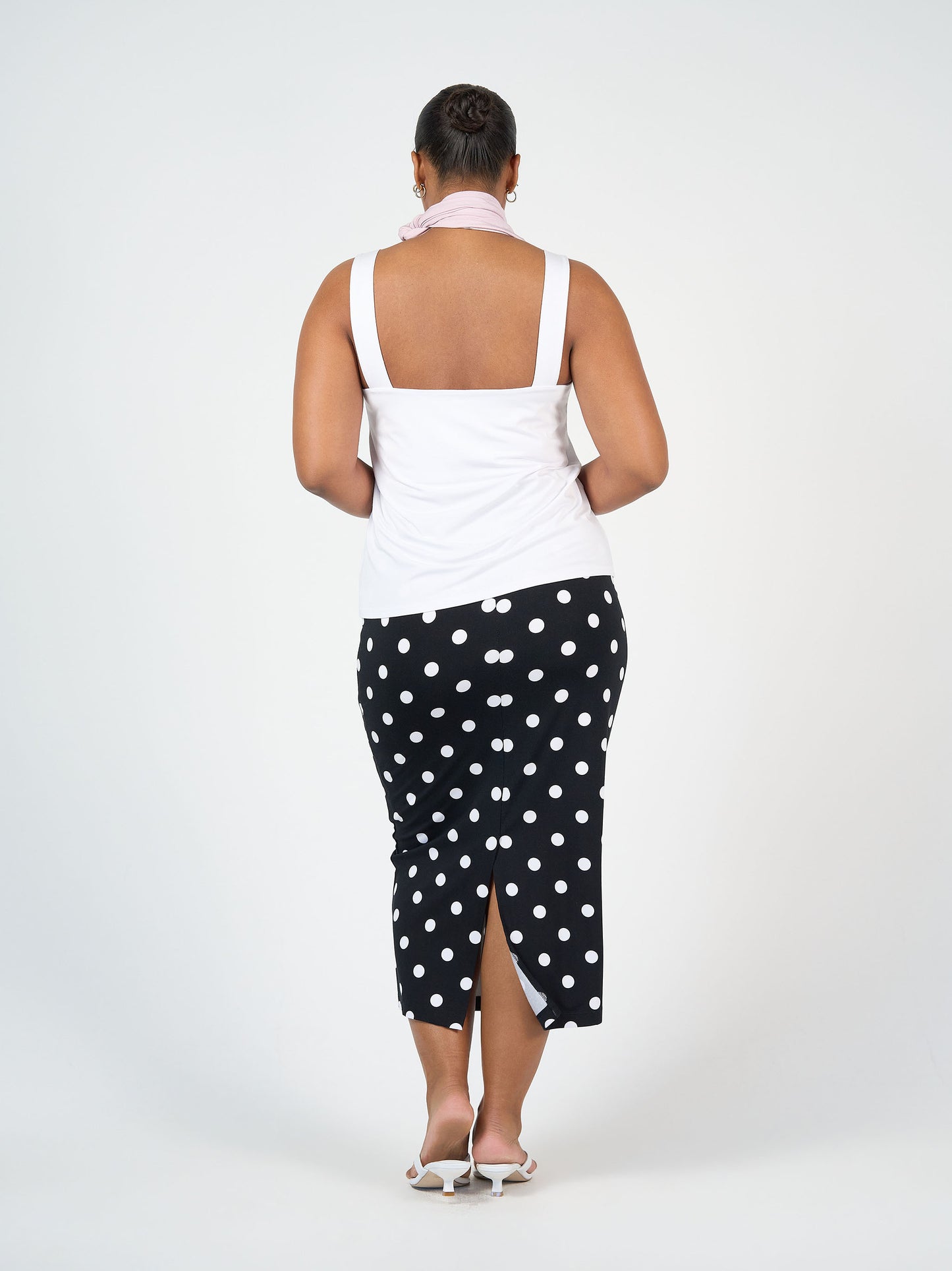Lou Lou Australia white sleeveless top and black and white polka dot tube skirt