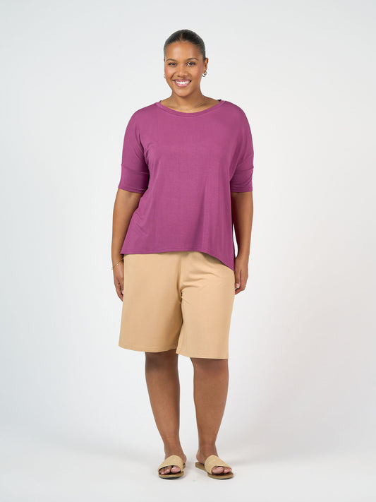 Lou Lou Australia Gina Oversized Slouch Bamboo T-Shirt in Plum, featuring a loose, short-sleeve fit.