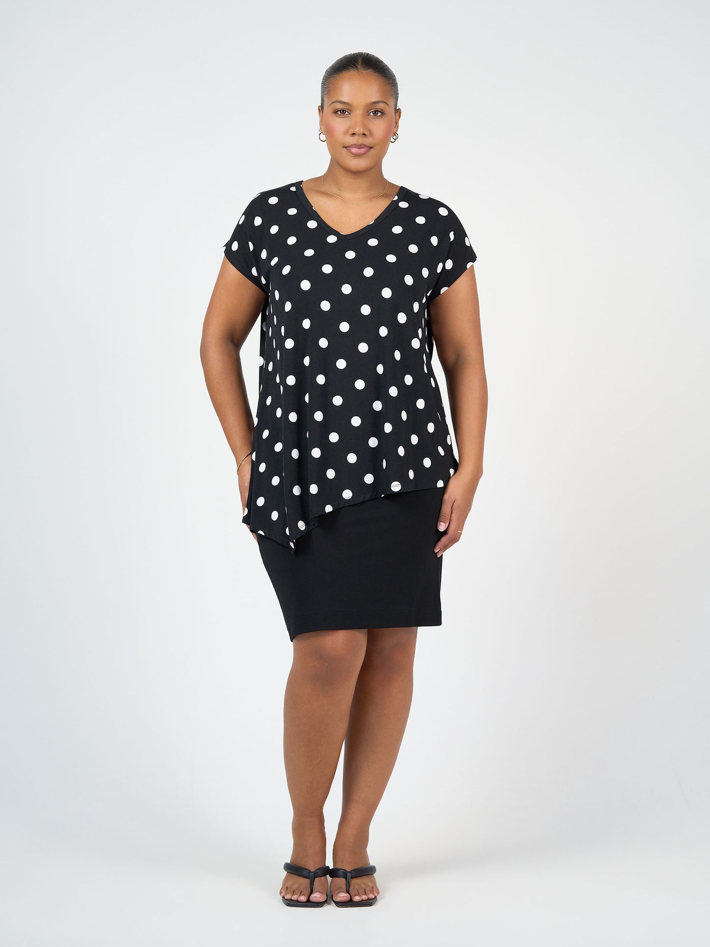 Lou Lou Australia bamboo asymmetrical Black top with white Polka Dots and black Midi Tube skirt