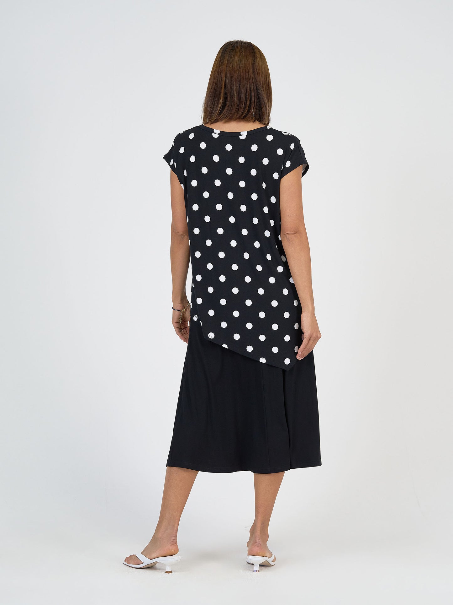 Lou Lou Australia bamboo asymmetrical Black top with white Polka Dots and matching Black mid length a line skirt