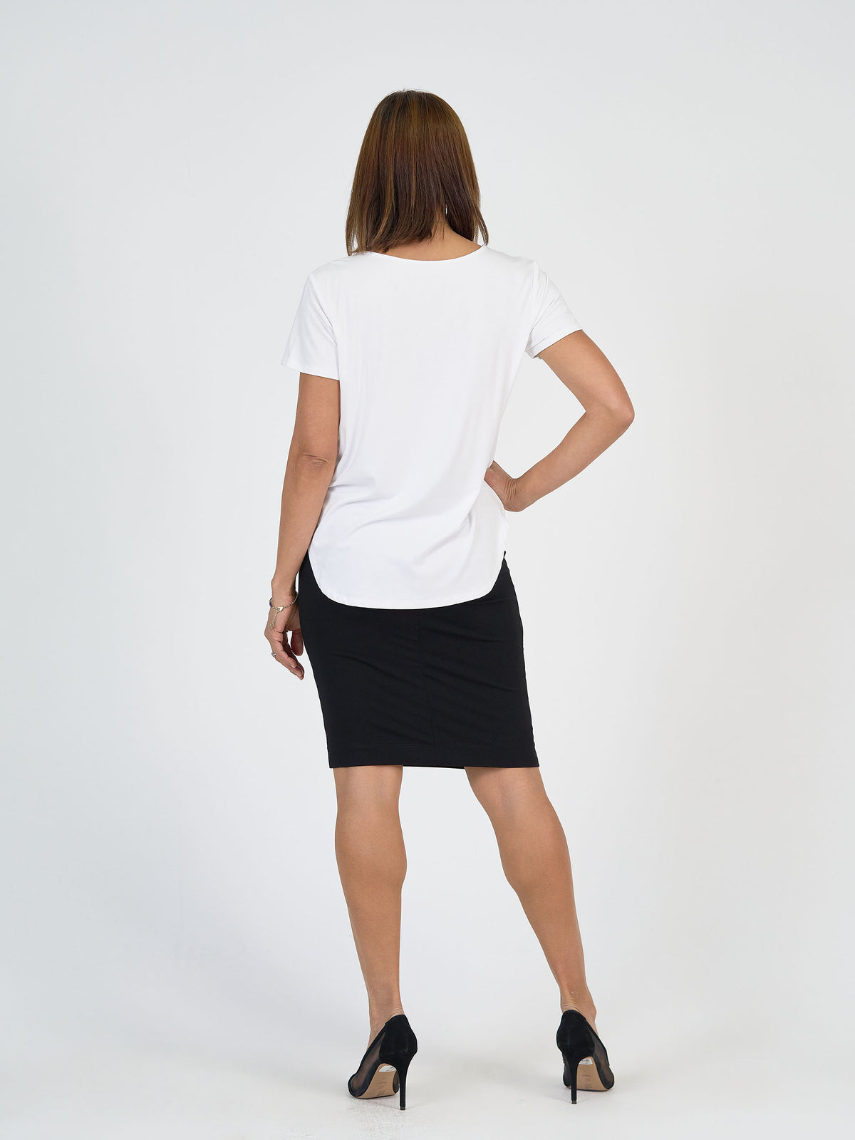 The Working Lunch Set by Lou Lou Australia features a white bamboo tee and black knee-length midi tube skirt.