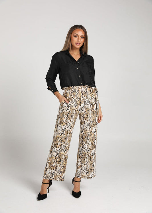 Lou Lou Australia Silk Long-sleeve Shirt in black, made from silk.