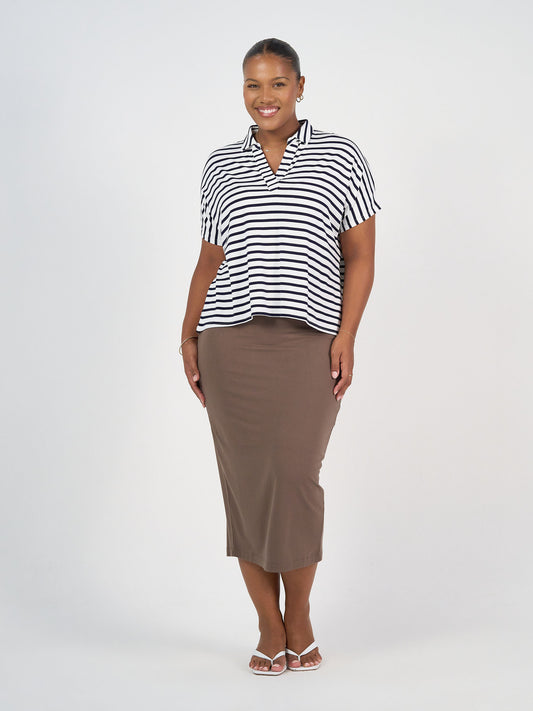 Lou Lou Australia Maxi Bamboo Whitney Tube Skirt in Chocolate, made from bamboo, shown with a black-and-white striped blouse.