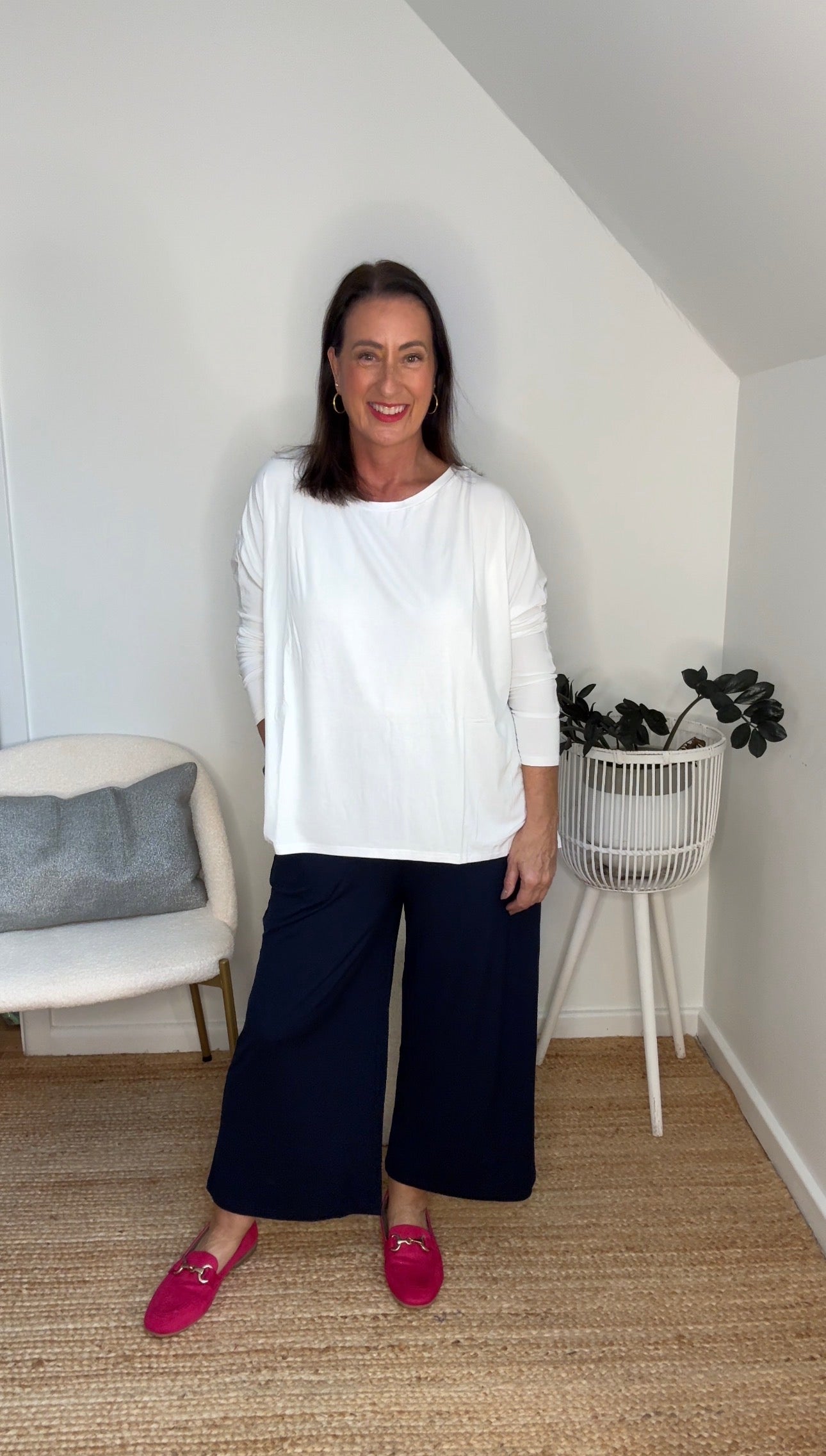 @salt.water.nomad wearing Lou Lou Australia navy bamboo culottes with white long sleeve bamboo top