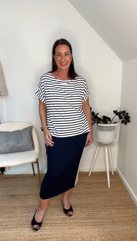 @salt.water.nomad wearing Lou Lou Australia navy maxi tube skirt with bamboo top
