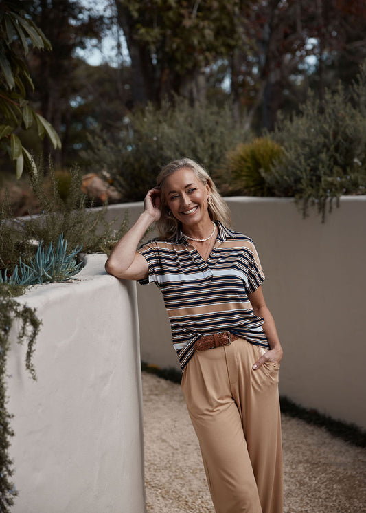 Lou Lou Australia Rush Bamboo Short Sleeve Collared Polo Top in stripe pattern and beige colours.