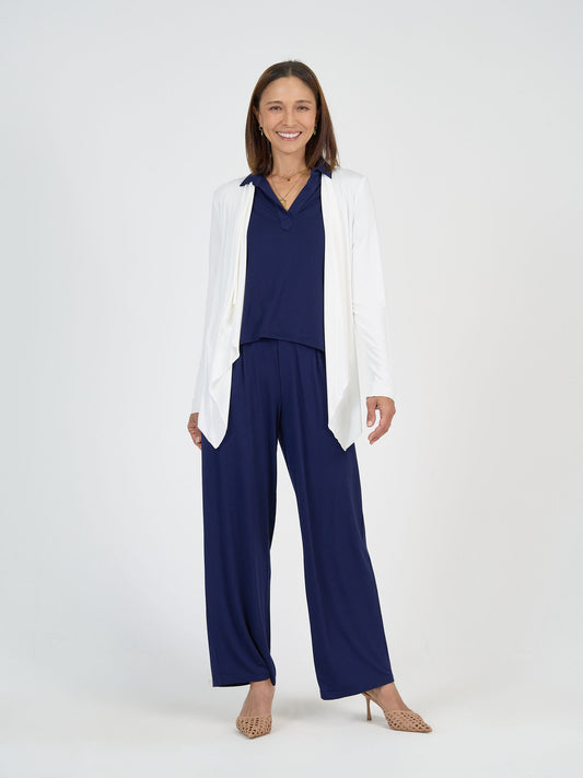 The Classroom Set by Lou Lou Australia: navy blue bamboo top, wide leg dress pants, and white open-front cardigan.