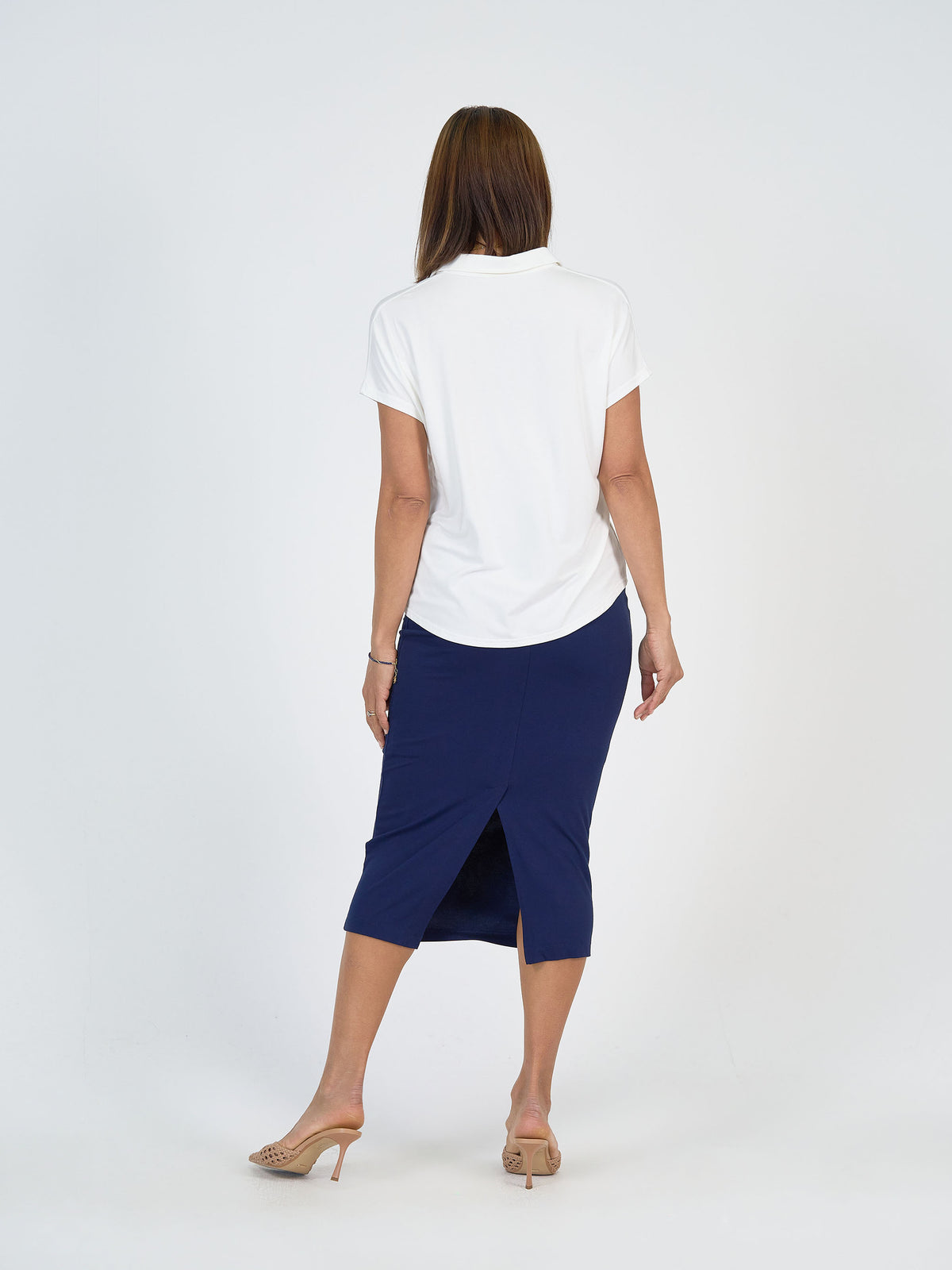 Lou Lou Australia Rush Bamboo Short Sleeve Collared Polo Top in cream.