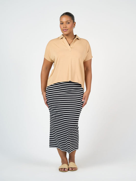 Lou Lou Australia Rush Bamboo Short Sleeve Collared Polo Top in tan.