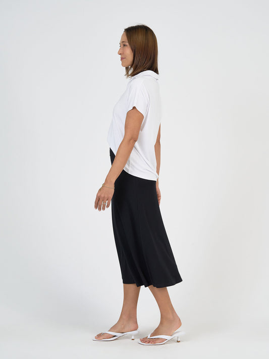 Lou Lou Australia Rush Bamboo Short Sleeve Collared Polo Top in white.