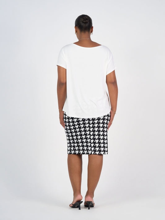 Lou Lou Australia Wilde Bamboo Box Fit Tee in Cream, made from bamboo fabric.