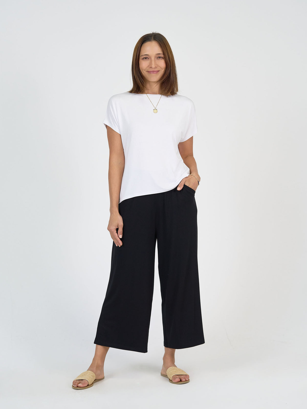 Lou Lou Australia Wilde Bamboo Box Fit Tee in white with short sleeves.
