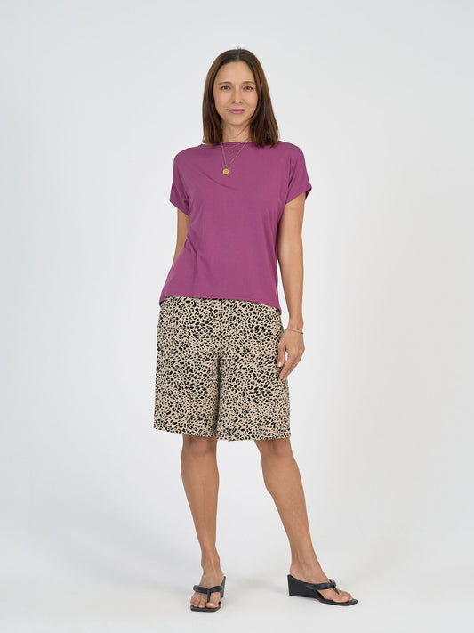 Lou Lou Australia Bamboo purple t shirt and beige leopard  knee length wide leg shorts.