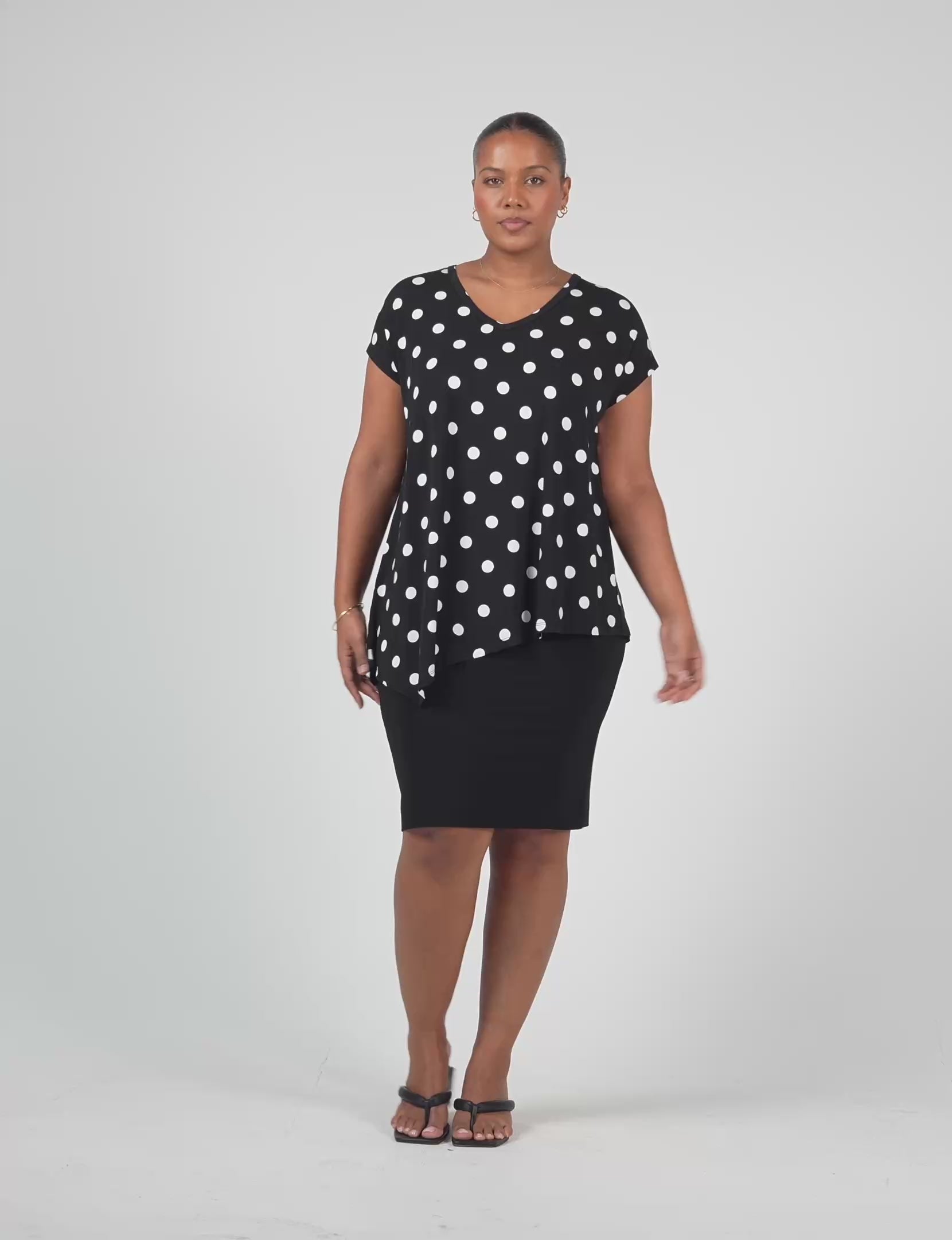 Lou Lou Australia bamboo asymmetrical Black top with white Polka Dots and black Midi Tube skirt