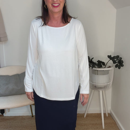 @salt.water.nomad wearing Lou Lou Australia white bamboo long sleeve top