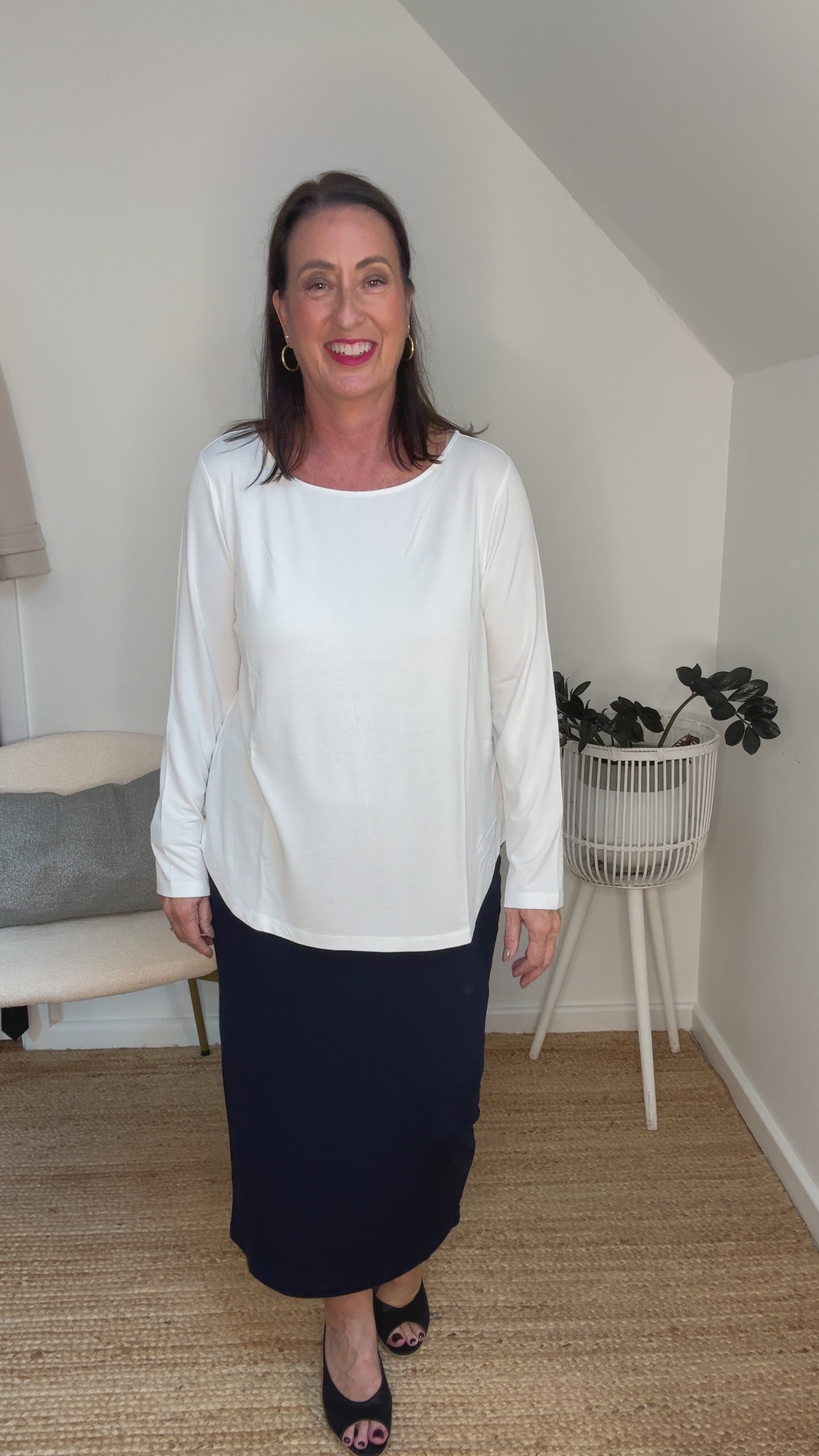 @salt.water.nomad wearing Lou Lou Australia white bamboo long sleeve top