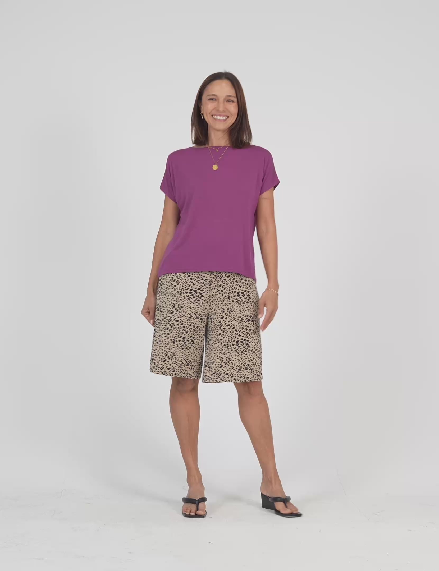 Lou Lou Australia Bamboo purple t shirt and beige leopard  knee length wide leg shorts.