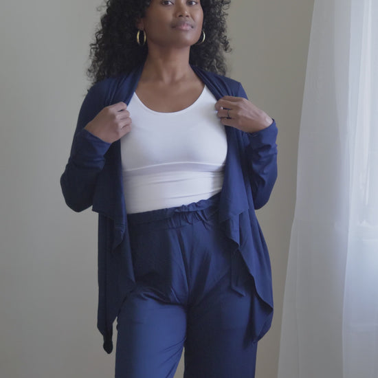 @melanesian.mumma in lou lou australia navy bamboo cardigan and dress pant with white bamboo crop top