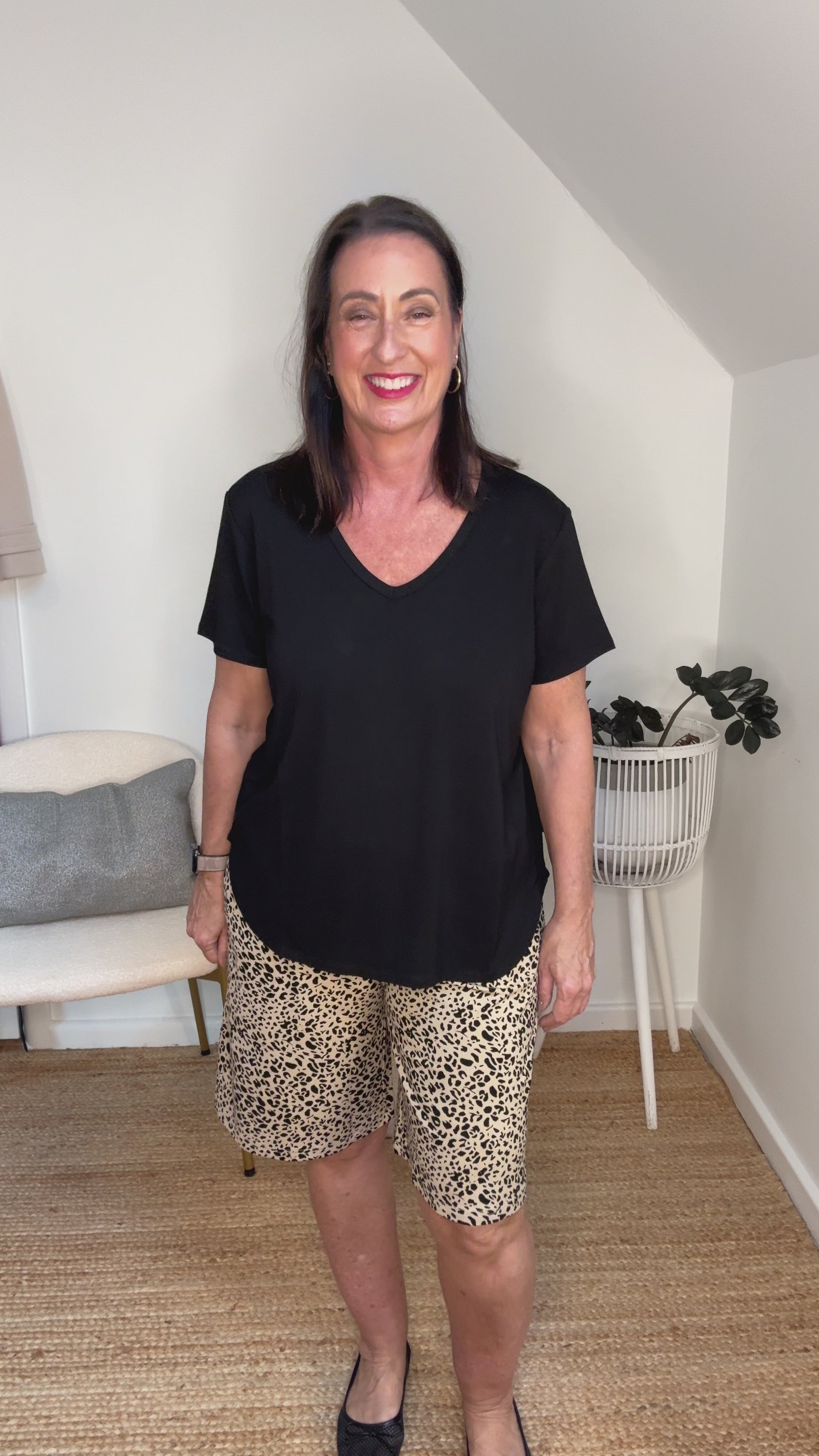@salt.water.nomad wearing Lou Lou Australia black v-neck tee