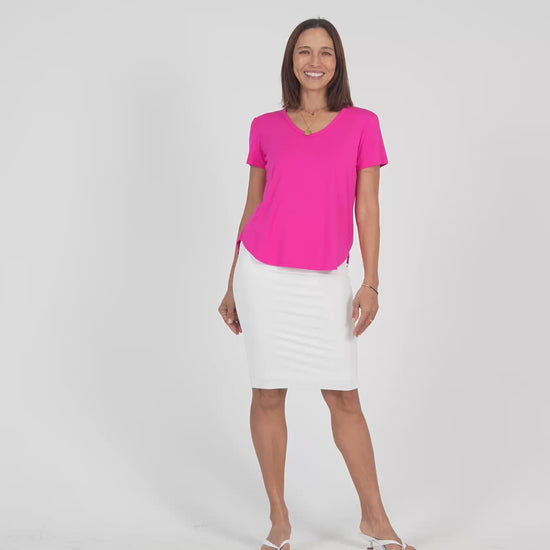 Lou Lou Australia Bamboo midi length white tube skirt with a pink v neck t shirt