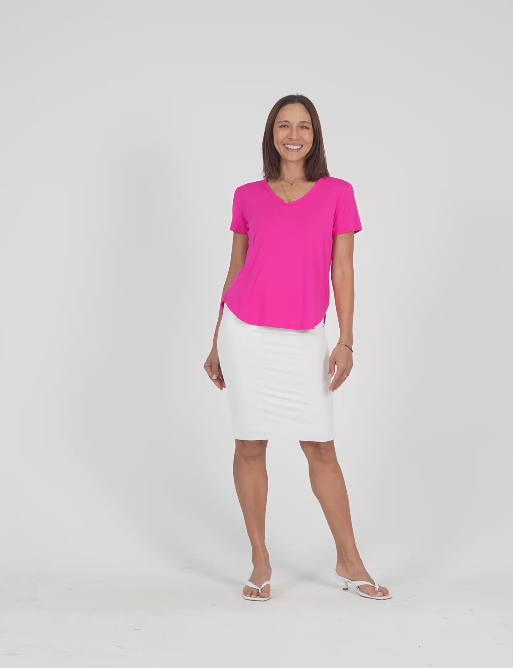 Lou Lou Australia Bamboo midi length white tube skirt with a pink v neck t shirt
