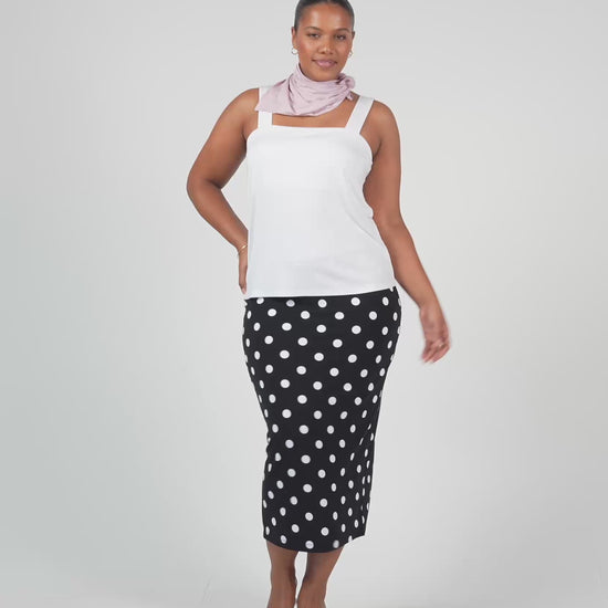 Lou Lou Australia white sleeveless top and black and white polka dot tube skirt
