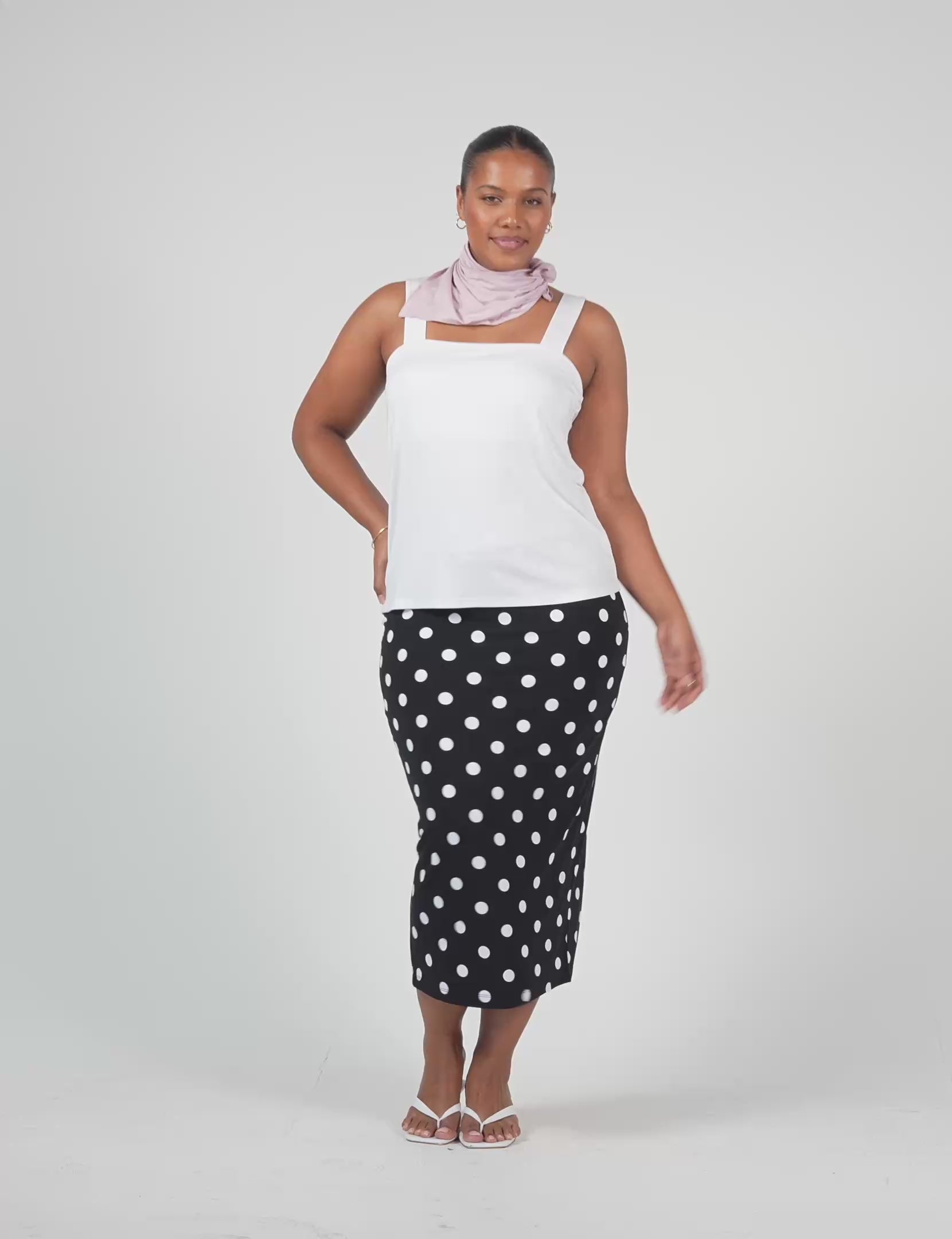 Lou Lou Australia white sleeveless top and black and white polka dot tube skirt