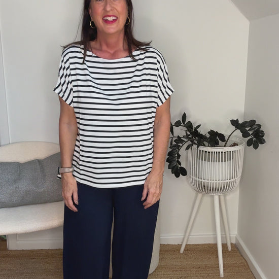 @salt.water.nomad wearing Lou Lou Australia navy & white striped bamboo top with culottes
