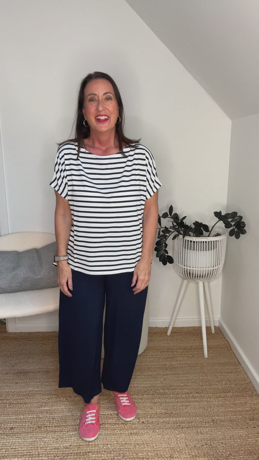 @salt.water.nomad wearing Lou Lou Australia navy & white striped bamboo top with culottes