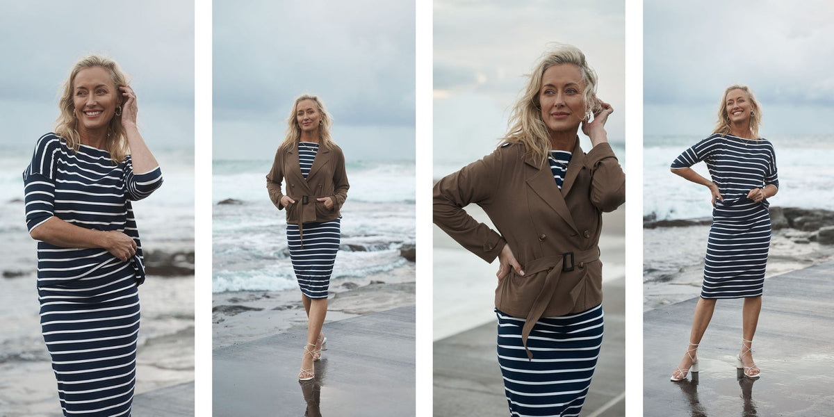 Lou Lou Australia navy and white striped bamboo dress with a tan jacket.